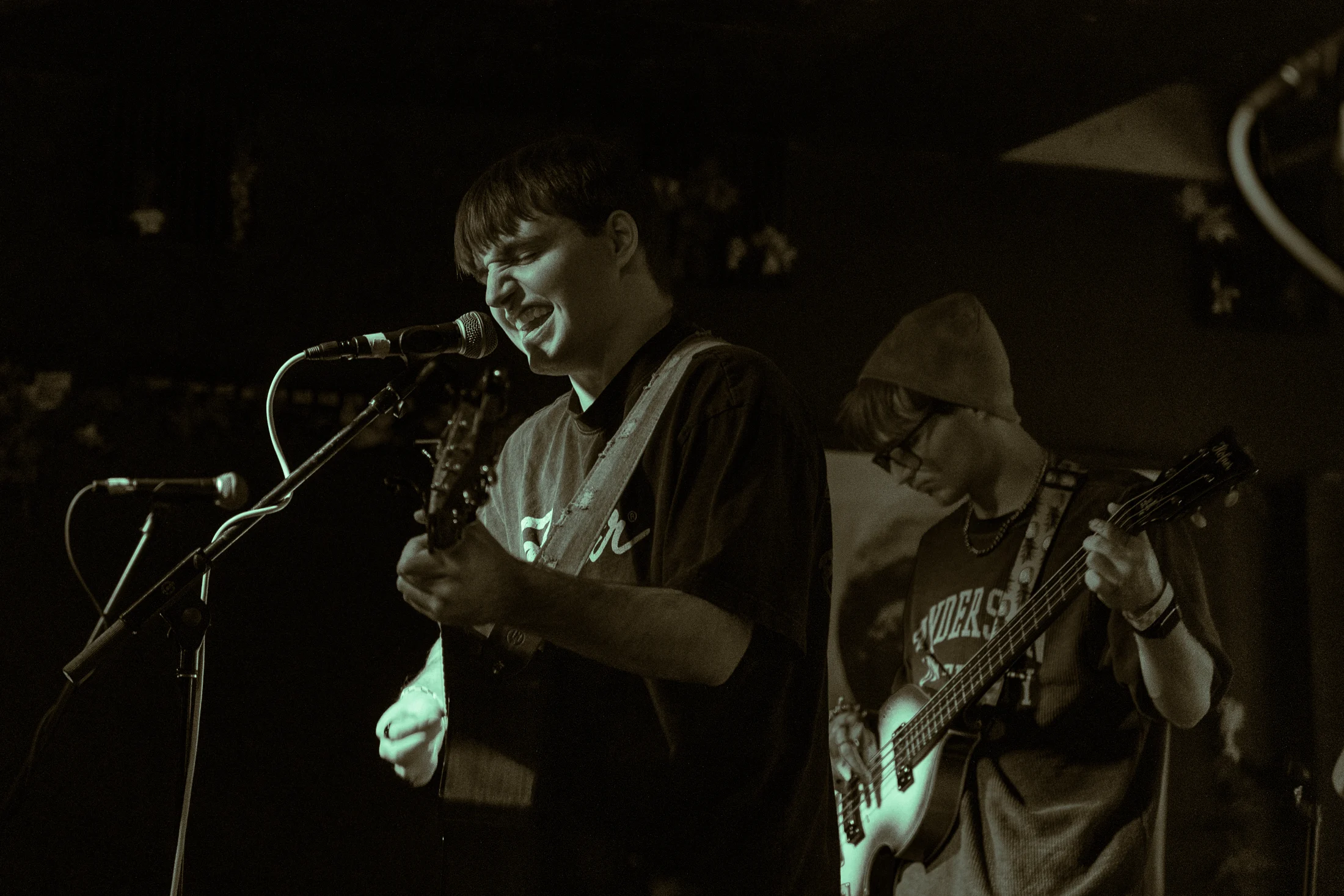 Hollowstem vocalist and bassist performing on stage